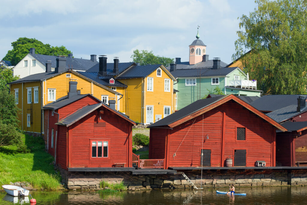 Colourful wooden houses and riverside warehouses in Old Porvoo