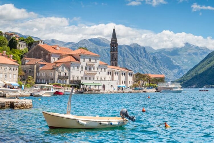 The historic waterfront and mountains of the Bay of Kotor.